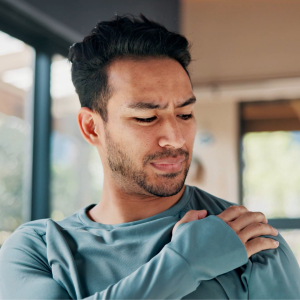Pain Management Campaign 2026 Social Tiles5 Male holding his left shoulder with a look of pain on his face